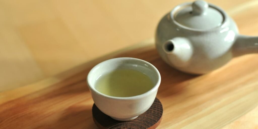 Teapot with green tea